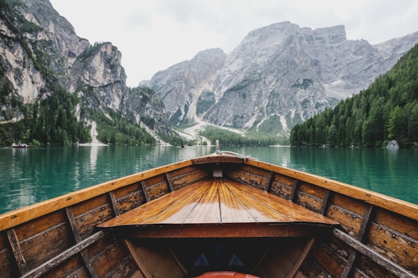 Canoe on misty lake morning